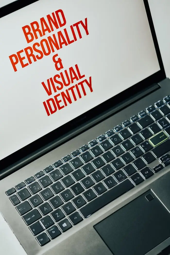 Home Laptop screen showing text on brand personality and visual identity for marketing strategy.